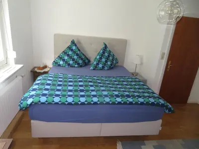 Ein Bett oder Betten in einem Zimmer der Unterkunft Ferienwohnung Christine am Weissenbach