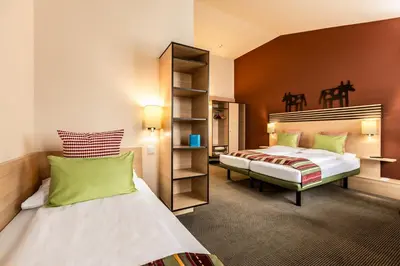 Ein Bett oder Betten in einem Zimmer der Unterkunft TUI BLUE Schladming