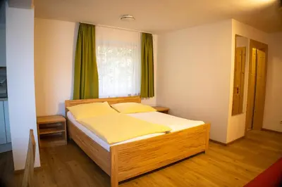 Ein Bett oder Betten in einem Zimmer der Unterkunft Gasthof-Pension Riedl