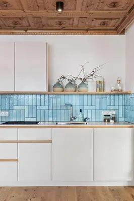 Küche/Küchenzeile in der Unterkunft Holzhackerin - the charming Haus am Berg