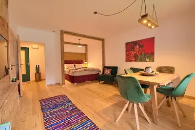 Ein Bett oder Betten in einem Zimmer der Unterkunft Alpen Apartment Werfenweng - Ruhe - Pool