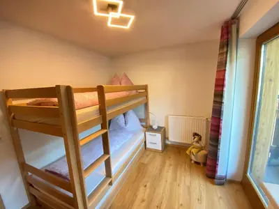 Ein Bett oder Betten in einem Zimmer der Unterkunft Chalet Auszeit