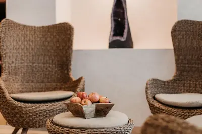 Ein Sitzbereich in der Unterkunft Aparthotel Rubinius