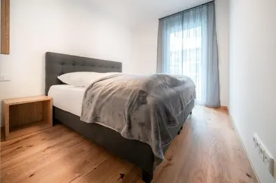 Ein Bett oder Betten in einem Zimmer der Unterkunft Das Conrad by Schladming-Appartements