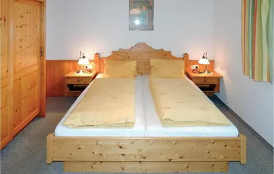 Ein Bett oder Betten in einem Zimmer der Unterkunft Helle Ferienwohnung In Flachau