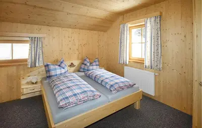 Ein Bett oder Betten in einem Zimmer der Unterkunft Luxurioese Ferienhaus Sauna
