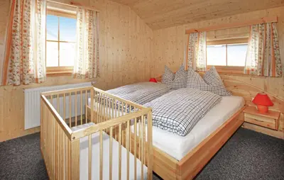 Ein Bett oder Betten in einem Zimmer der Unterkunft Luxurioese Ferienhaus Sauna