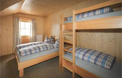 Ein Bett oder Betten in einem Zimmer der Unterkunft Ferienhaus Mit Sauna