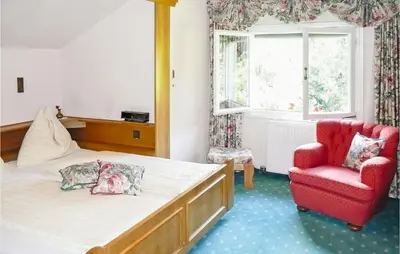 Ein Bett oder Betten in einem Zimmer der Unterkunft Ferienhaus In Ruhiger Lage