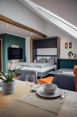 Ein Sitzbereich in der Unterkunft Aberle Apartments