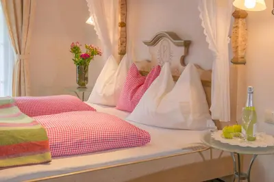 Ein Bett oder Betten in einem Zimmer der Unterkunft Hubengut Bed and Breakfast