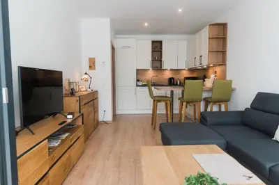 TV/Unterhaltungsangebot in der Unterkunft Ferienwohnung Bergsonne mit Sonnenbalkon und Tiefgaragen Parkplatz