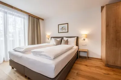 Ein Bett oder Betten in einem Zimmer der Unterkunft Haus Margareth