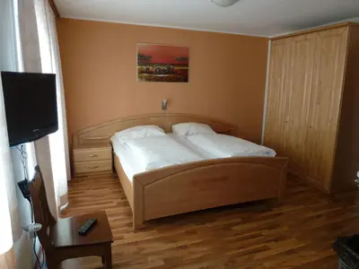 Ein Bett oder Betten in einem Zimmer der Unterkunft Ferienhaus Teigi