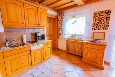 Küche/Küchenzeile in der Unterkunft Bergidyll 10 by Alpenidyll Apartments