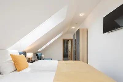 Ein Bett oder Betten in einem Zimmer der Unterkunft Granit Appartements