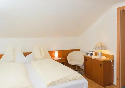 Ein Bett oder Betten in einem Zimmer der Unterkunft City Life 3 by Alpenidyll Apartments