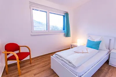 Ein Bett oder Betten in einem Zimmer der Unterkunft City Dream 1 by Alpenidyll Apartments