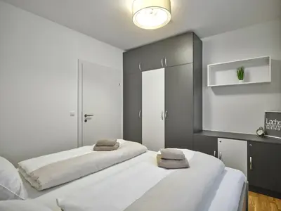 Ein Bett oder Betten in einem Zimmer der Unterkunft Sunlodge Oeblarn Top B1 Schladming-Dachstein