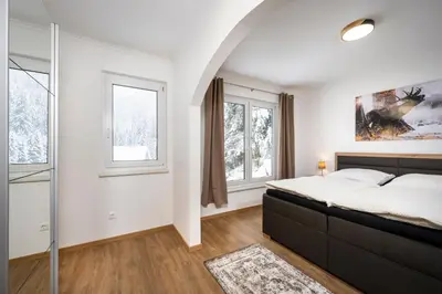 Ein Bett oder Betten in einem Zimmer der Unterkunft Ferienwohnung Weiß