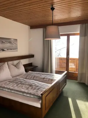Ein Bett oder Betten in einem Zimmer der Unterkunft Ferienhaus Gerti Werfenweng