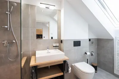 Ein Badezimmer in der Unterkunft Moxn Apartment Lungau - Small Penthouse mit Terrasse