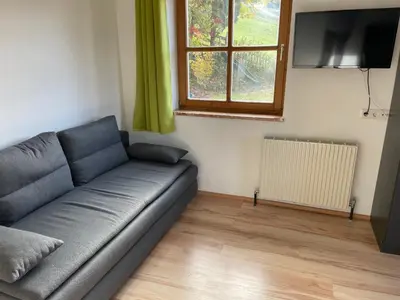 Ein Sitzbereich in der Unterkunft Apartment Sabrina