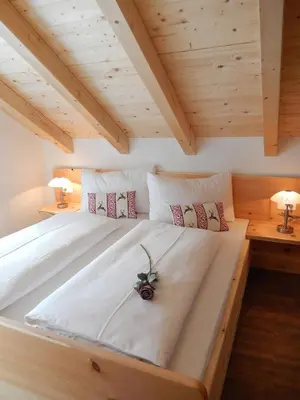 Ein Bett oder Betten in einem Zimmer der Unterkunft AlpenChalet Mitterberg