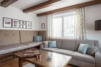 Ein Sitzbereich in der Unterkunft M-House FLACHAU Ganzes Haus für 8 Personen