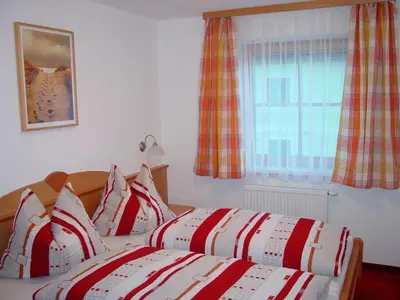 Ein Bett oder Betten in einem Zimmer der Unterkunft Ferienhaus Kaml Franz