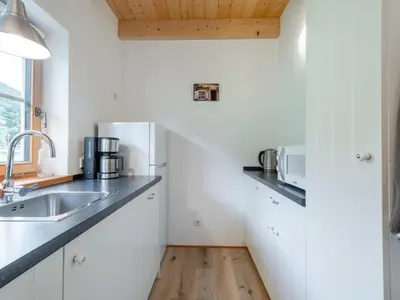 Küche/Küchenzeile in der Unterkunft Wolfgangchalet B