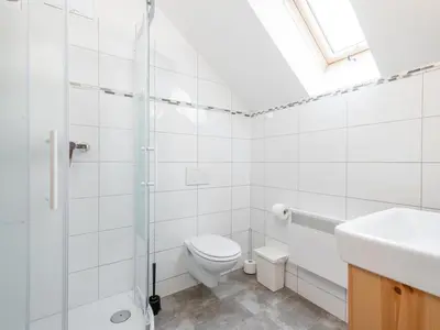 Ein Badezimmer in der Unterkunft Wolfgangchalet A