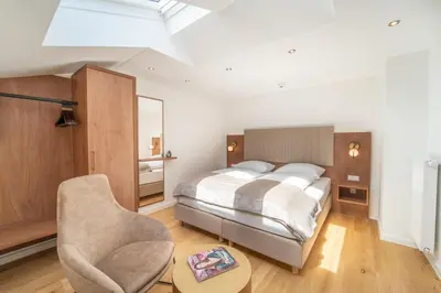 Ein Bett oder Betten in einem Zimmer der Unterkunft das mondsee