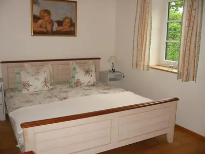 Ein Bett oder Betten in einem Zimmer der Unterkunft Ferienwohnung Am Pflanzgarten