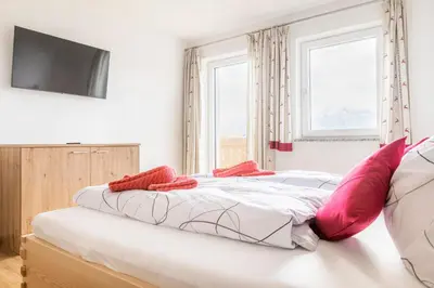 Ein Bett oder Betten in einem Zimmer der Unterkunft Ferienhaus Weitblick