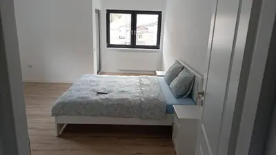 Ein Bett oder Betten in einem Zimmer der Unterkunft Center House
