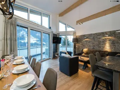 Ein Sitzbereich in der Unterkunft Penthouse Alpendorf