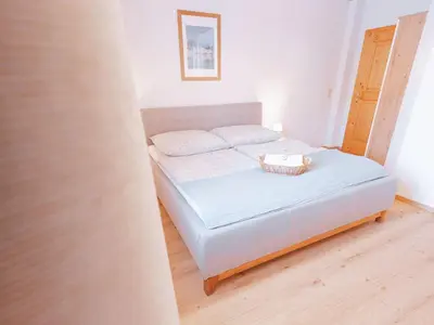Ein Bett oder Betten in einem Zimmer der Unterkunft Apartment Haus Toplitzsee nahe dem Grundlsee und Toplitzsee