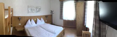 Ein Bett oder Betten in einem Zimmer der Unterkunft Ferienwohnungen Aigner