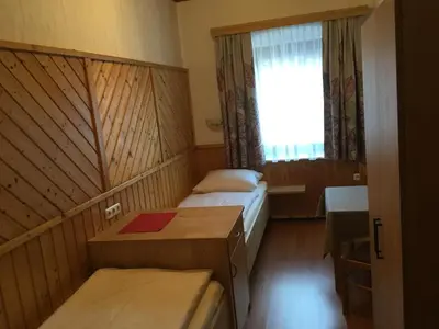 Ein Bett oder Betten in einem Zimmer der Unterkunft Ferienwohnungen Aigner