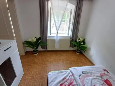 Ein Bett oder Betten in einem Zimmer der Unterkunft Wohnung im Nationalpark Kalkalpen 1