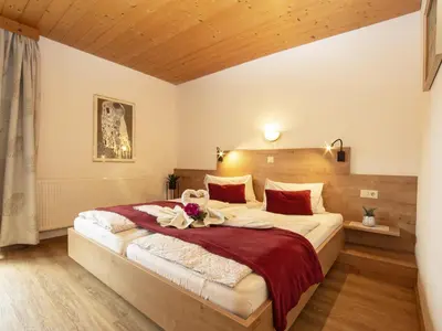 Ein Bett oder Betten in einem Zimmer der Unterkunft Haus Sonnleitn