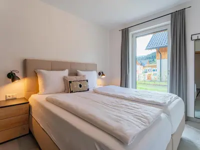 Ein Bett oder Betten in einem Zimmer der Unterkunft Mountain Chalet An der Mur
