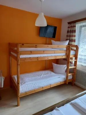 Ein Bett oder Betten in einem Zimmer der Unterkunft Gasthof zum Pfandl