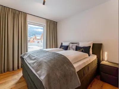 Ein Bett oder Betten in einem Zimmer der Unterkunft Mountain Chalet Luxx