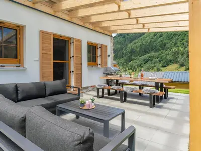 Ein Sitzbereich in der Unterkunft Ferienhaus Erna