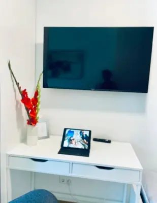 TV/Unterhaltungsangebot in der Unterkunft Luxury - Apartment mit Balkon in Seenähe