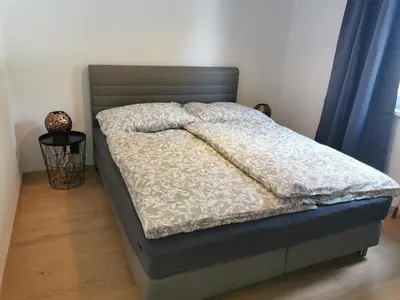 Ein Bett oder Betten in einem Zimmer der Unterkunft Am Grimming 14