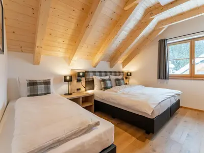 Ein Bett oder Betten in einem Zimmer der Unterkunft Chalet Pretzel