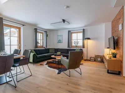 Ein Sitzbereich in der Unterkunft Chalet Pretzel